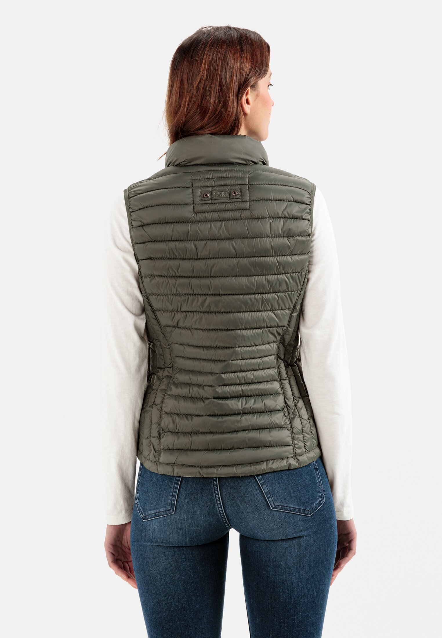 Women Quilted vest made from 100% recycled material Khaki worn back