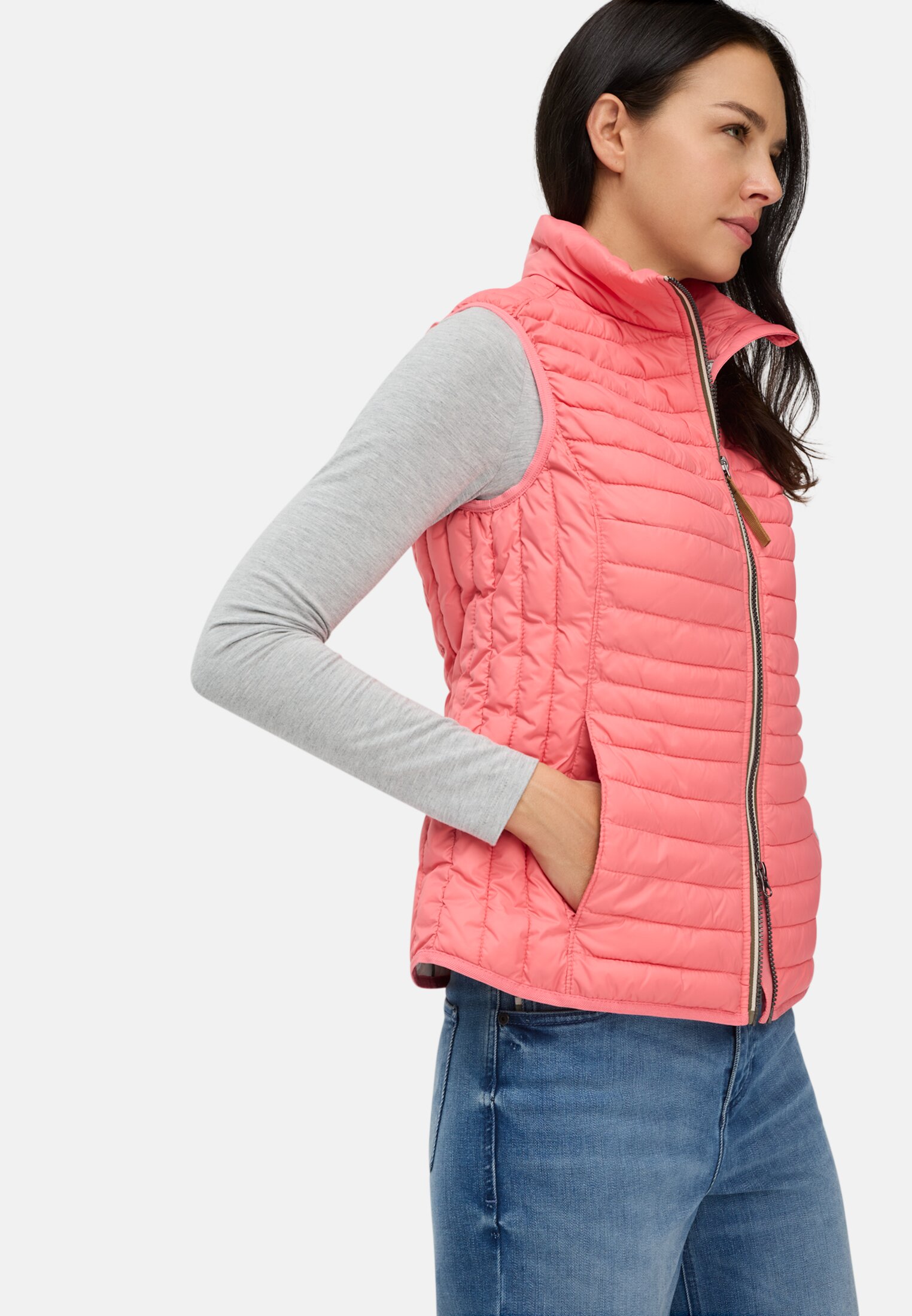 Women Quilted vest with reflective details Pink worn emotional