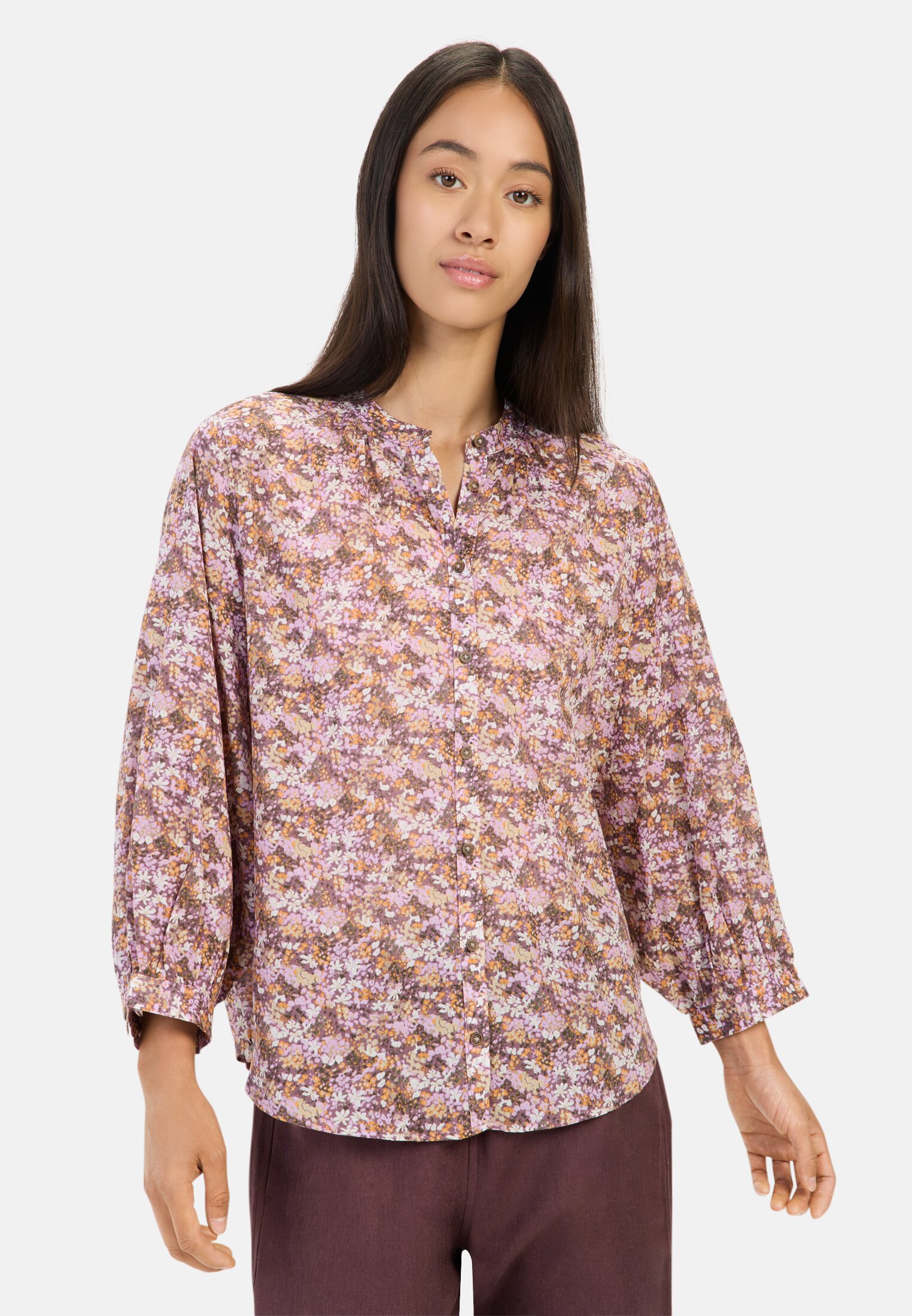 Women Blouse with all-over print Pink AOP worn front