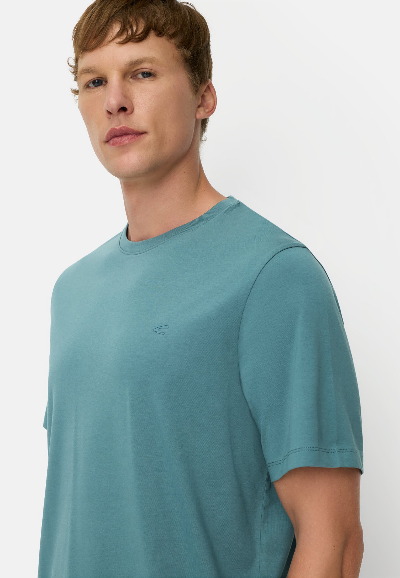 Men FleXXXactive© T-shirt with 4-way stretch Tide Blue worn detail close
