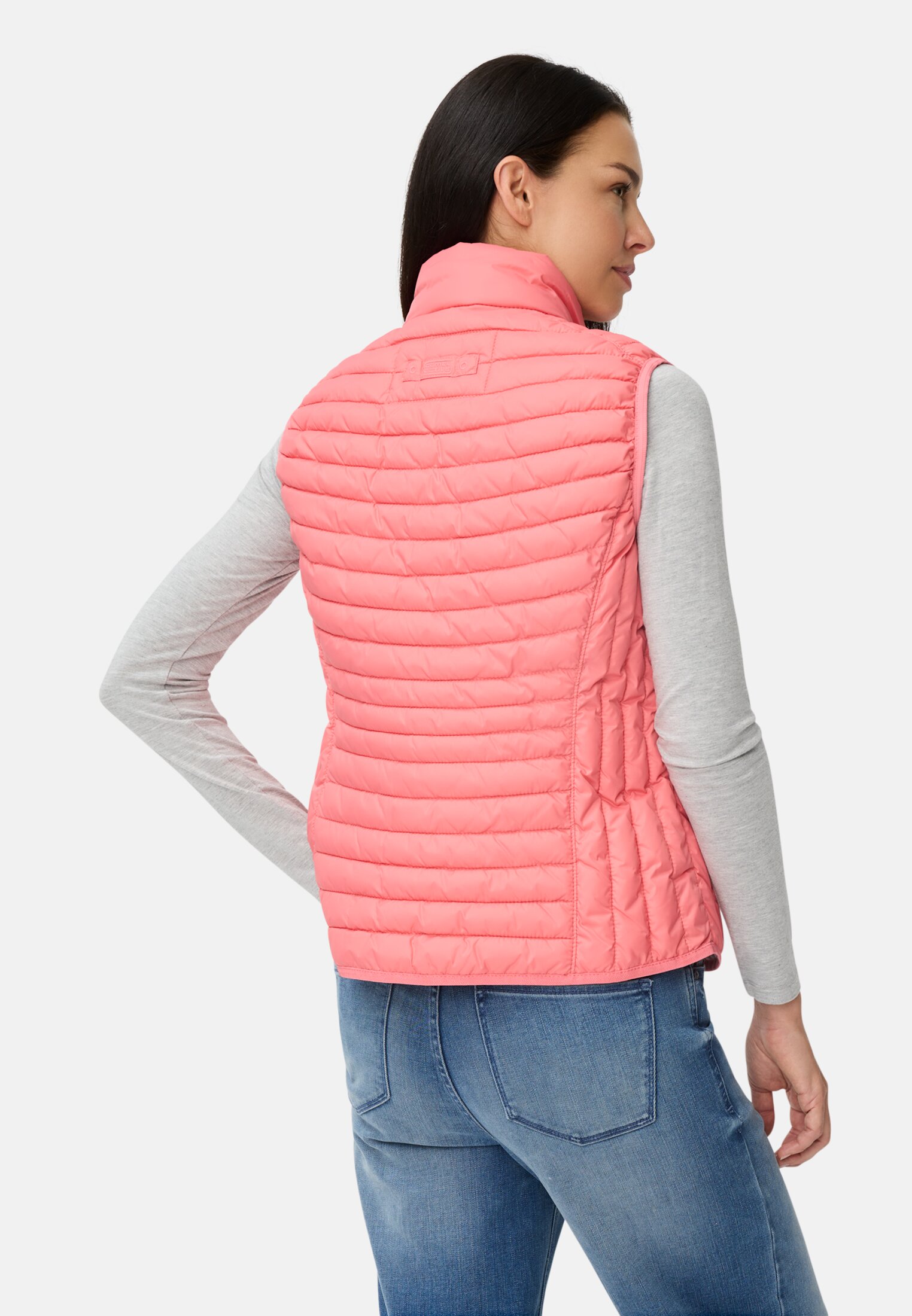 Women Quilted vest with reflective details Pink worn back