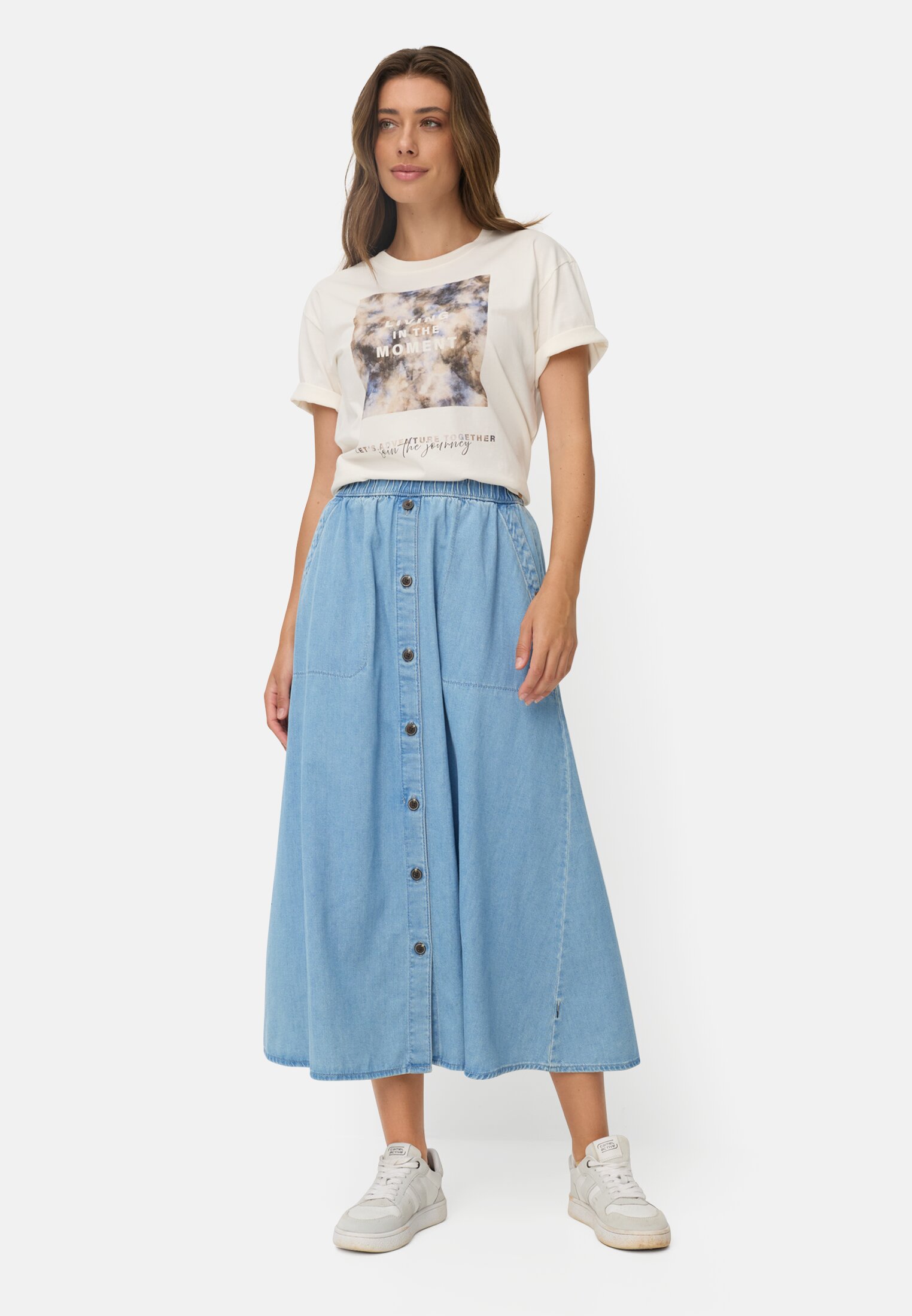Women Denim skirt with a button placket Light Blue worn front full body