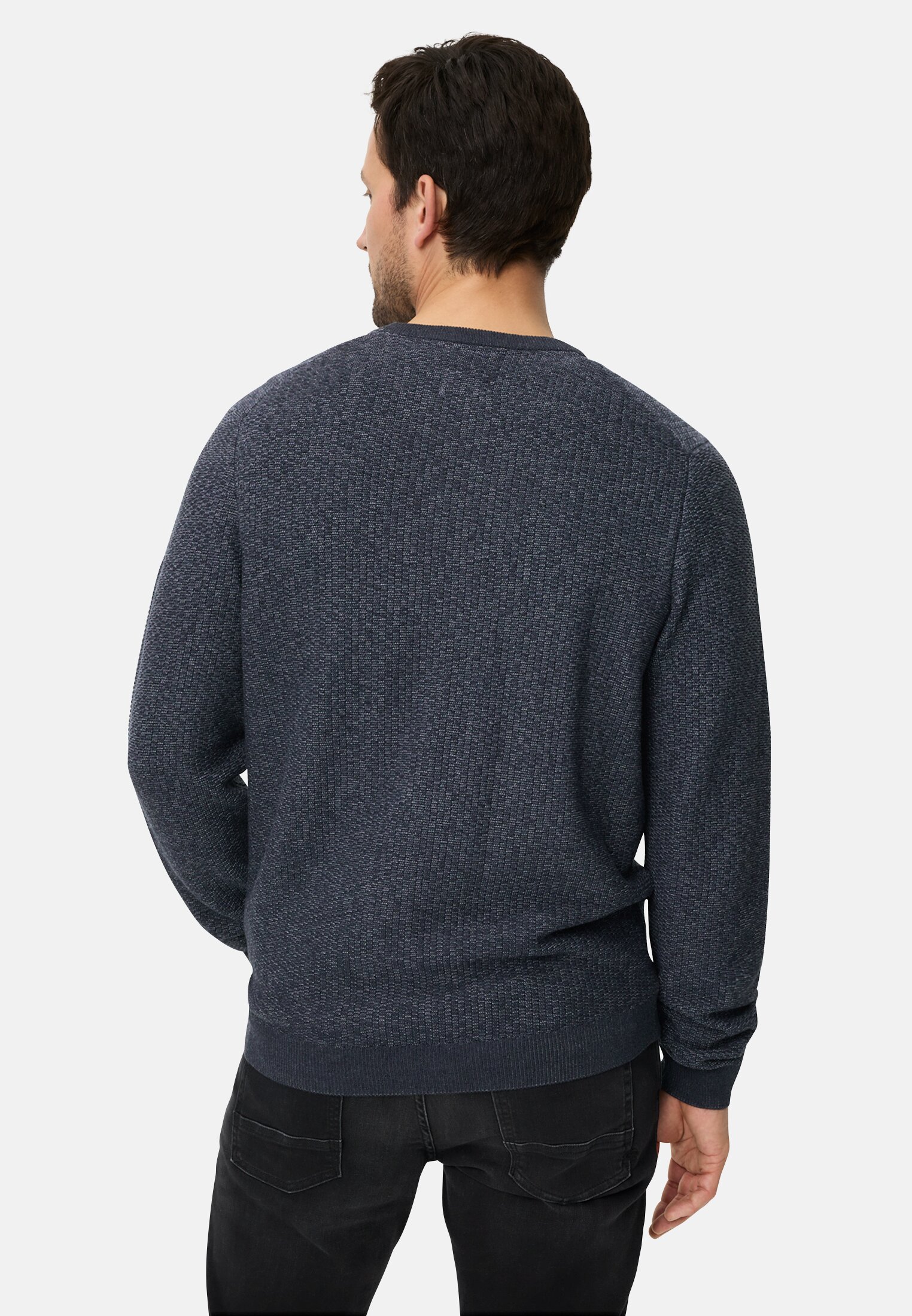 Men Knitted sweater with a round neck collar Ink blue worn back