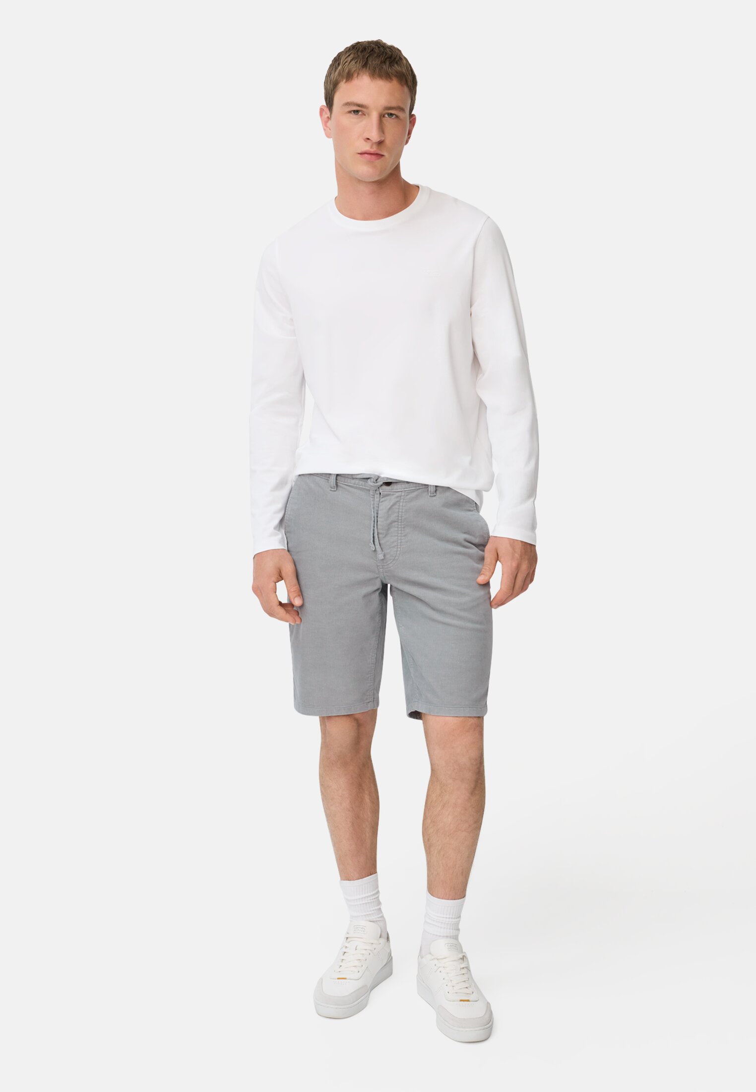 Men Relaxed fit shorts in cotton-polyester blend Ink blue worn front full body