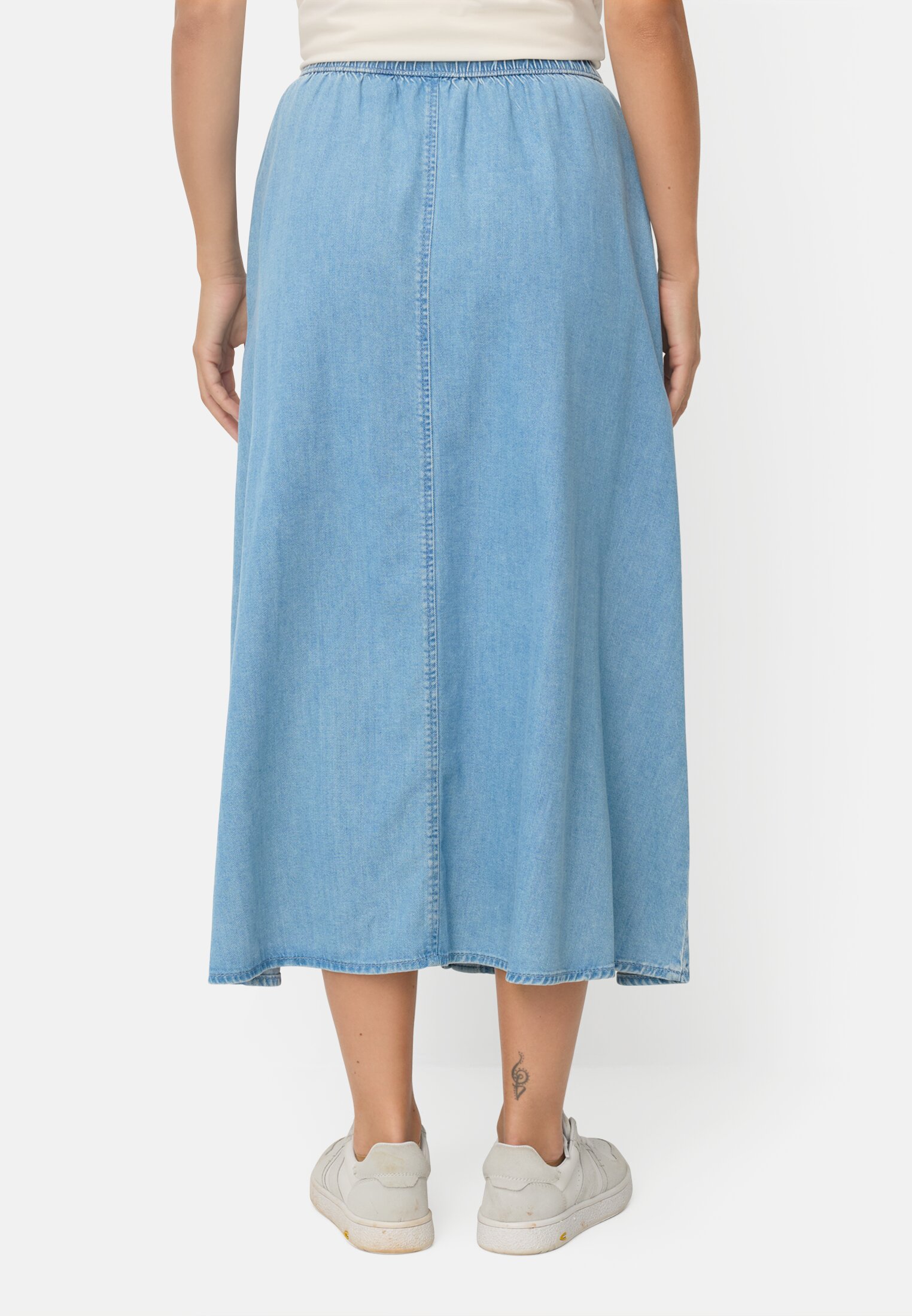 Women Denim skirt with a button placket Light Blue worn back
