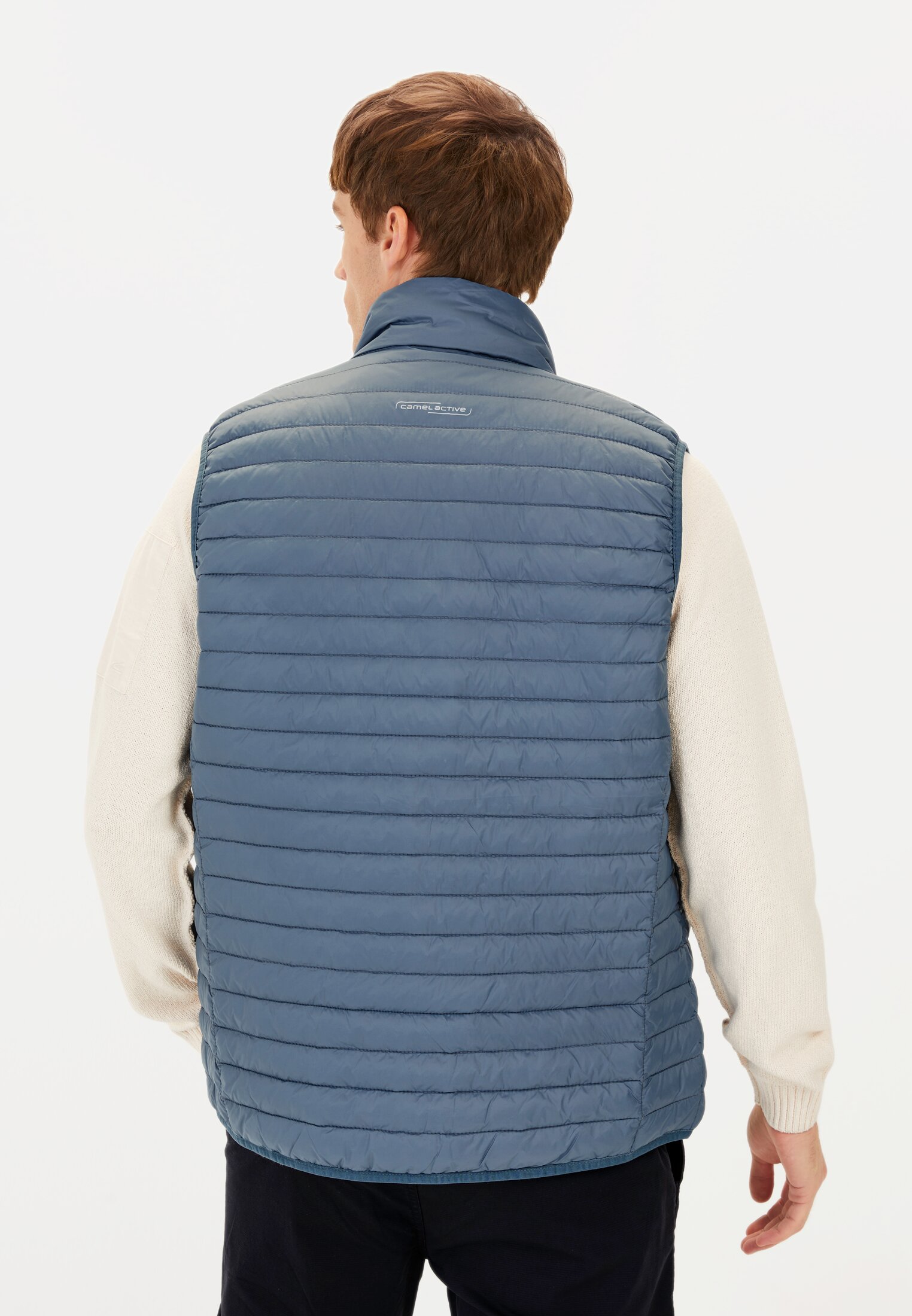 Men Quilted vest with stand-up collar Elemental Blue worn back
