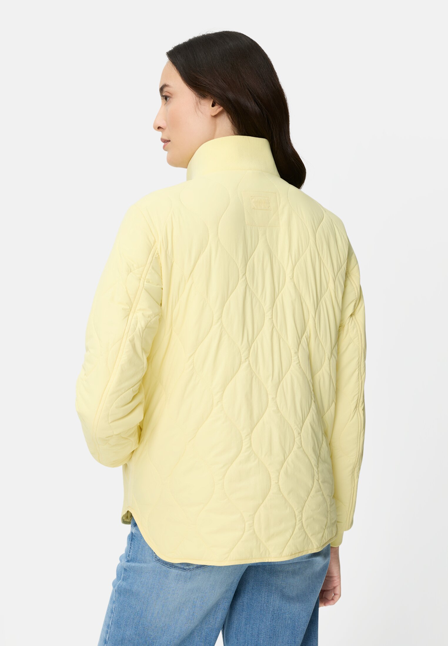 Damen Steppjacke mit Taschen Limonengelb getragen hinten
