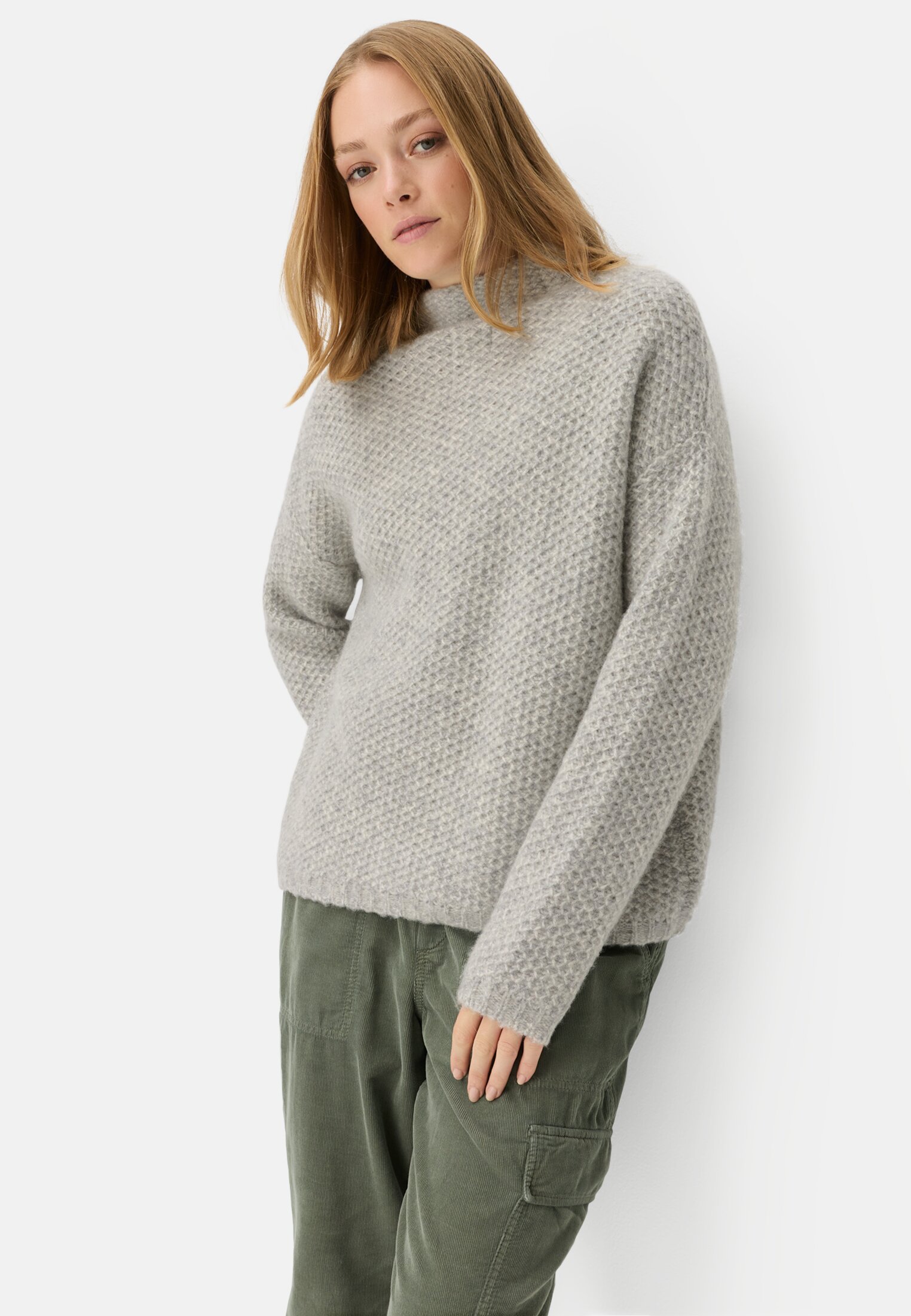 Women Knitted sweater with stand-up collar Gray worn emotional