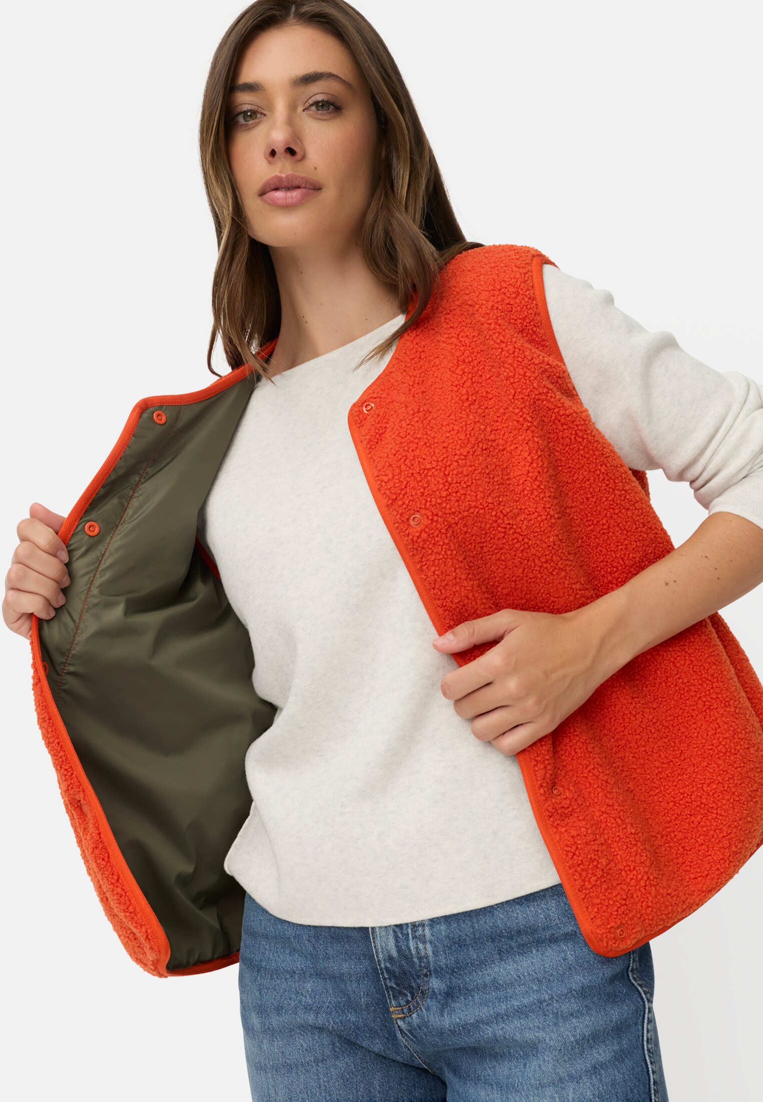 Vrouwen Teddyvest met zij-ingrepen pockets Oranje gedragen emotional