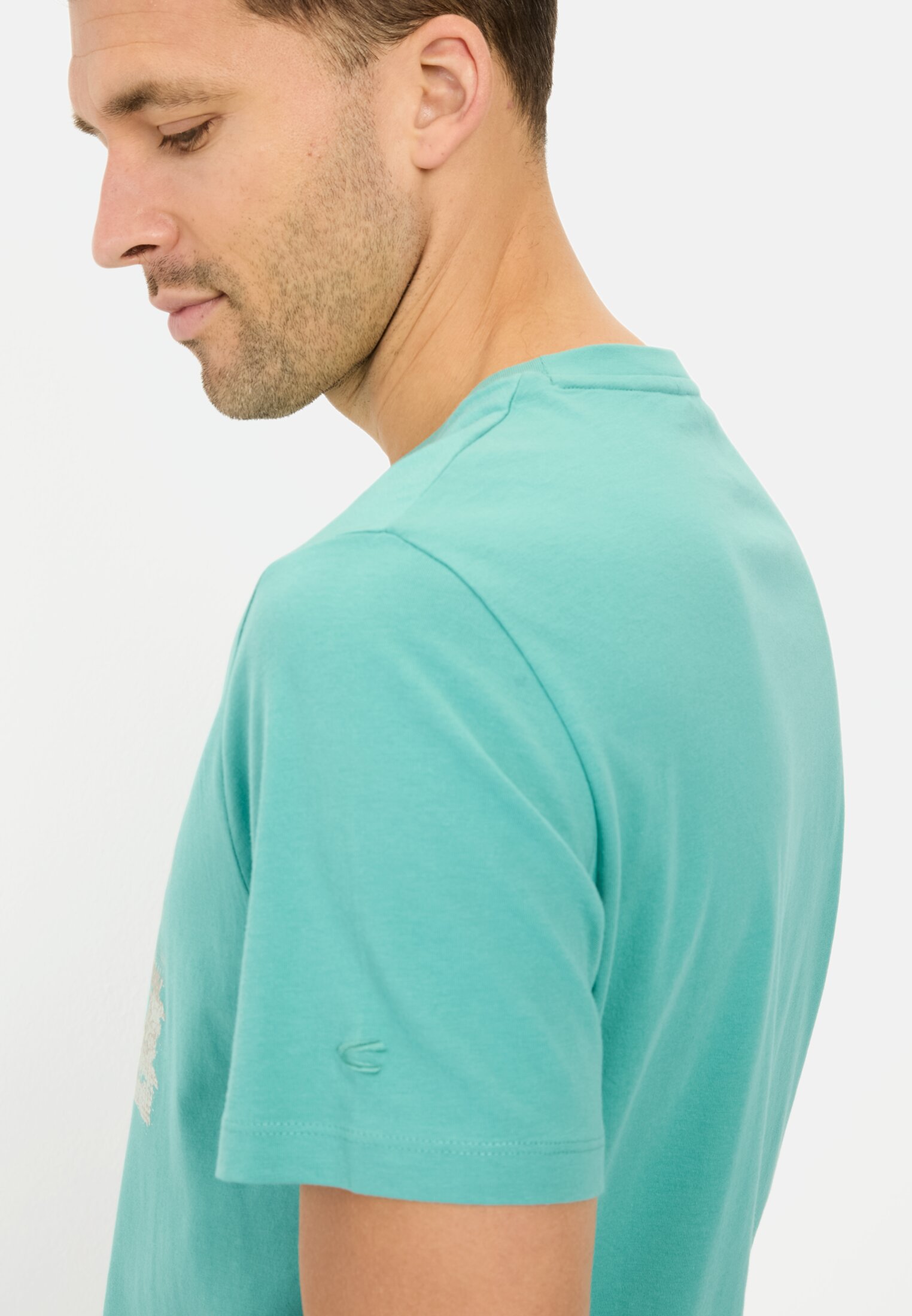 Men T-shirt made from organic cotton Agave Green worn detail close