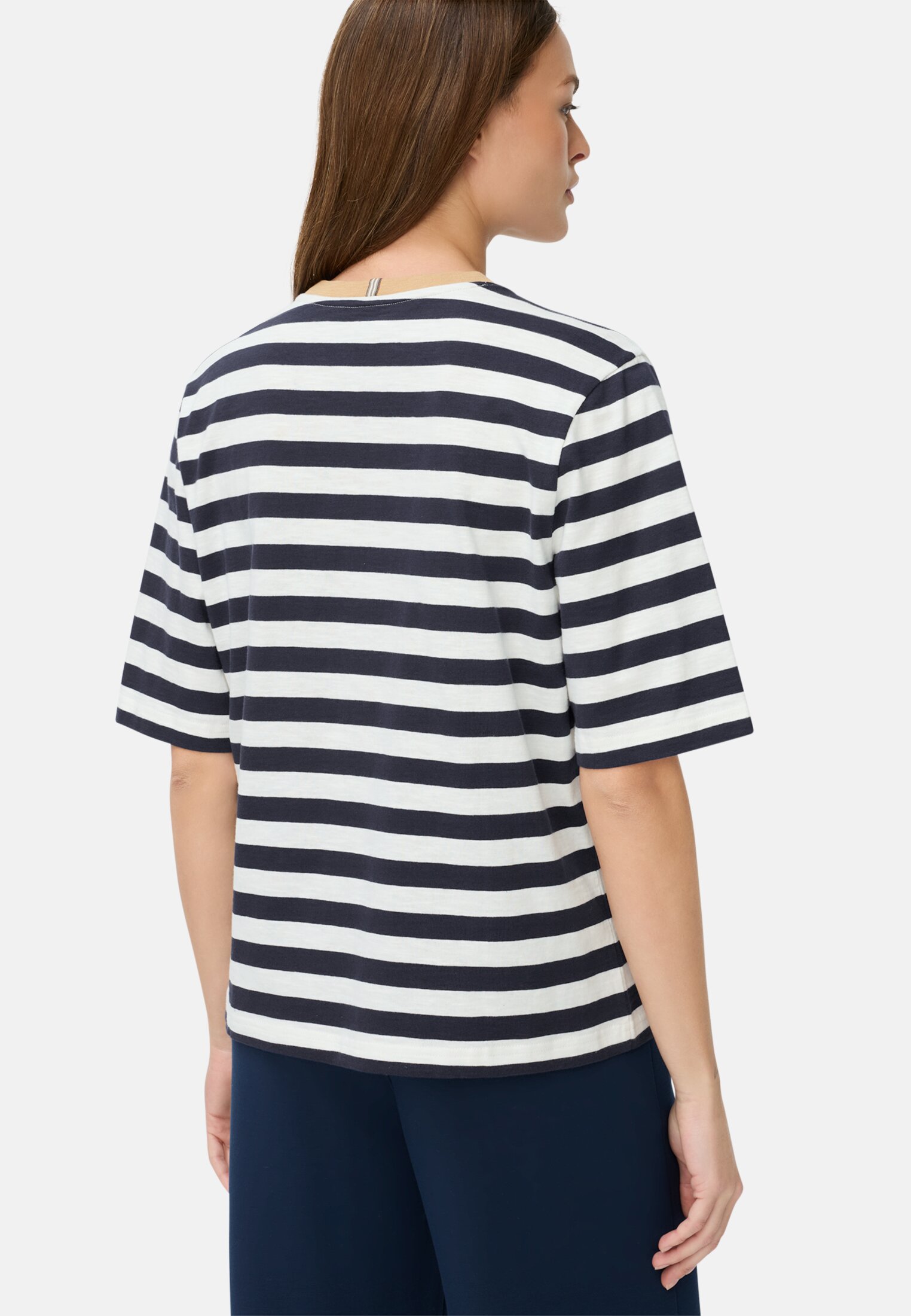 Women T-shirt with a striped pattern Blue and white striped worn back