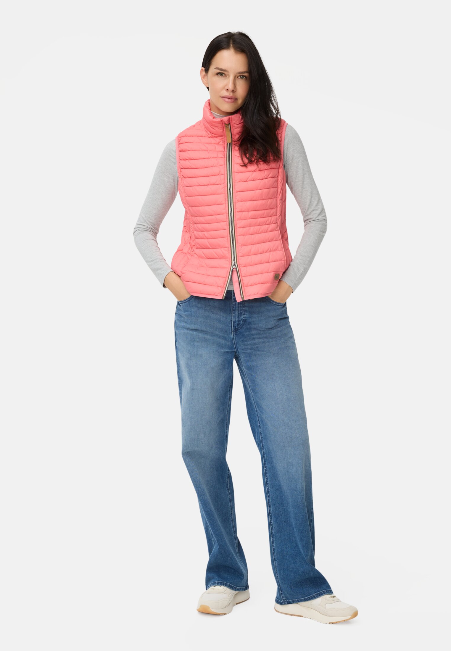 Women Quilted vest with reflective details Pink worn front full body