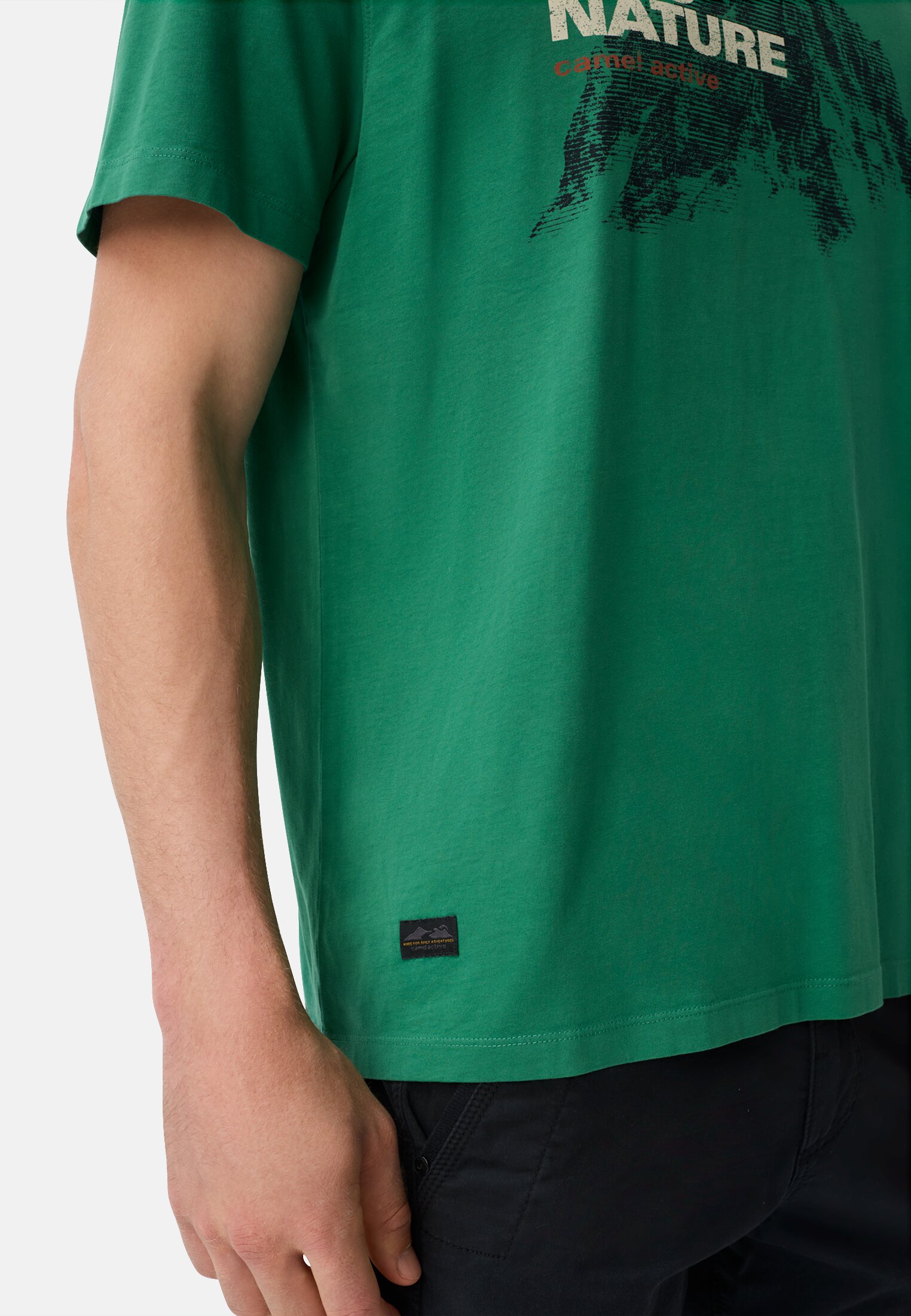 Men T-shirt made of pure cotton Fir green worn detail close