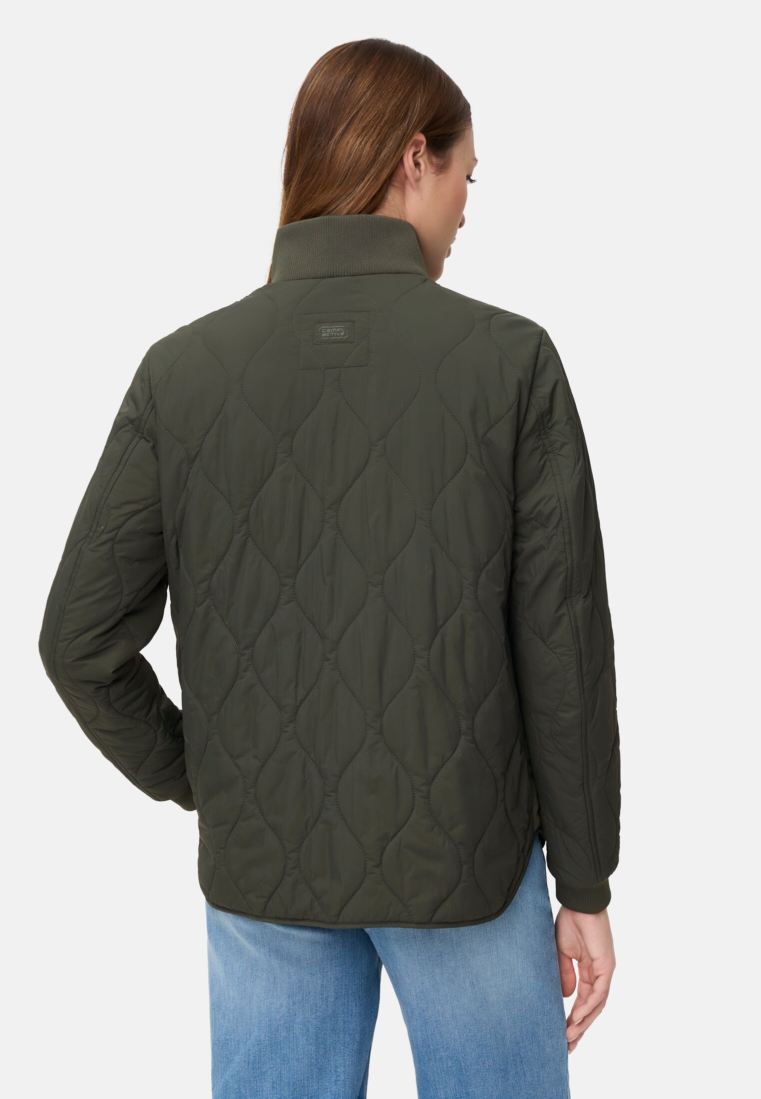 Damen Steppjacke mit Taschen Waldgrün getragen hinten