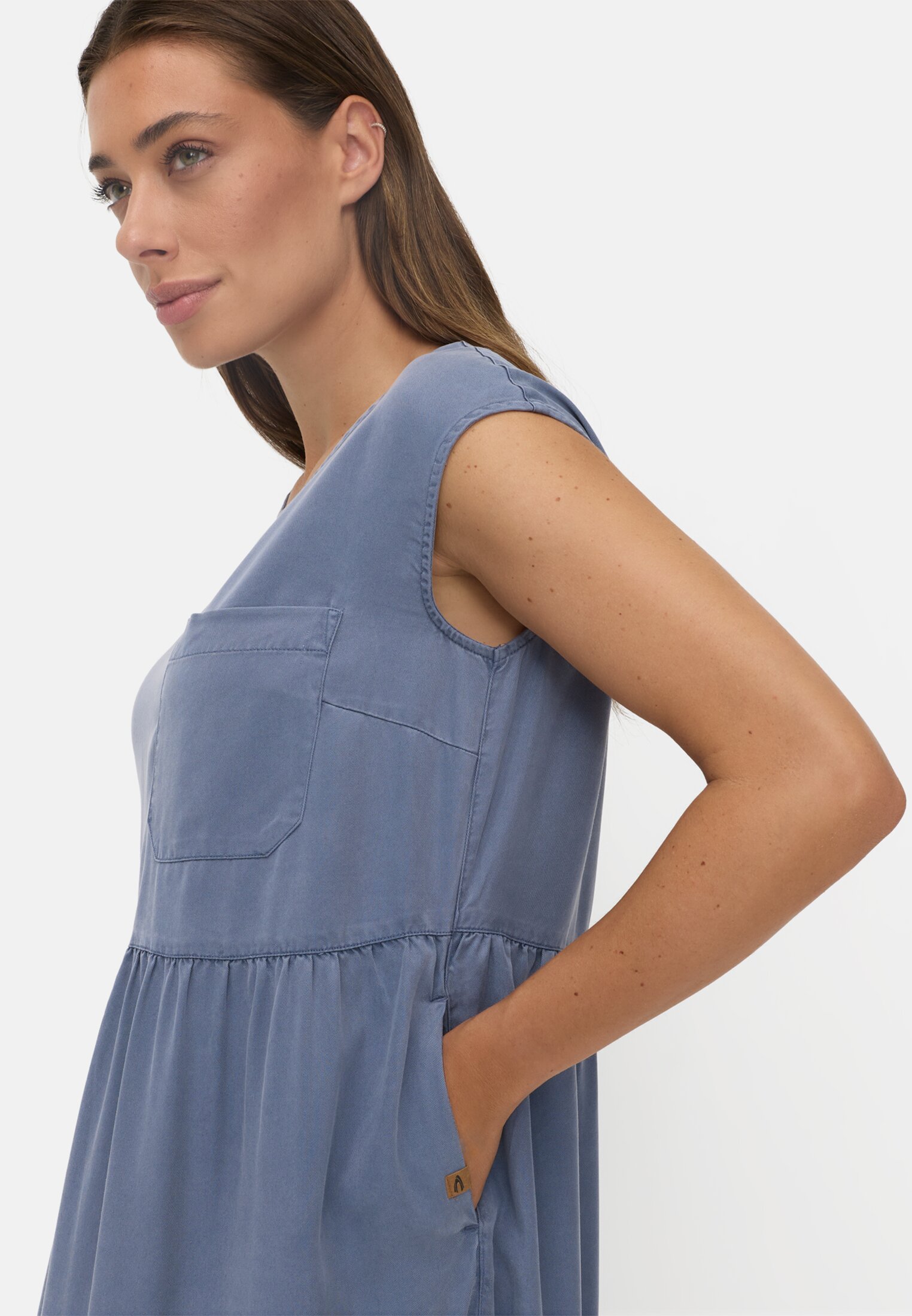 Women Summer dress with a breast pocket Ocean Blue worn detail close