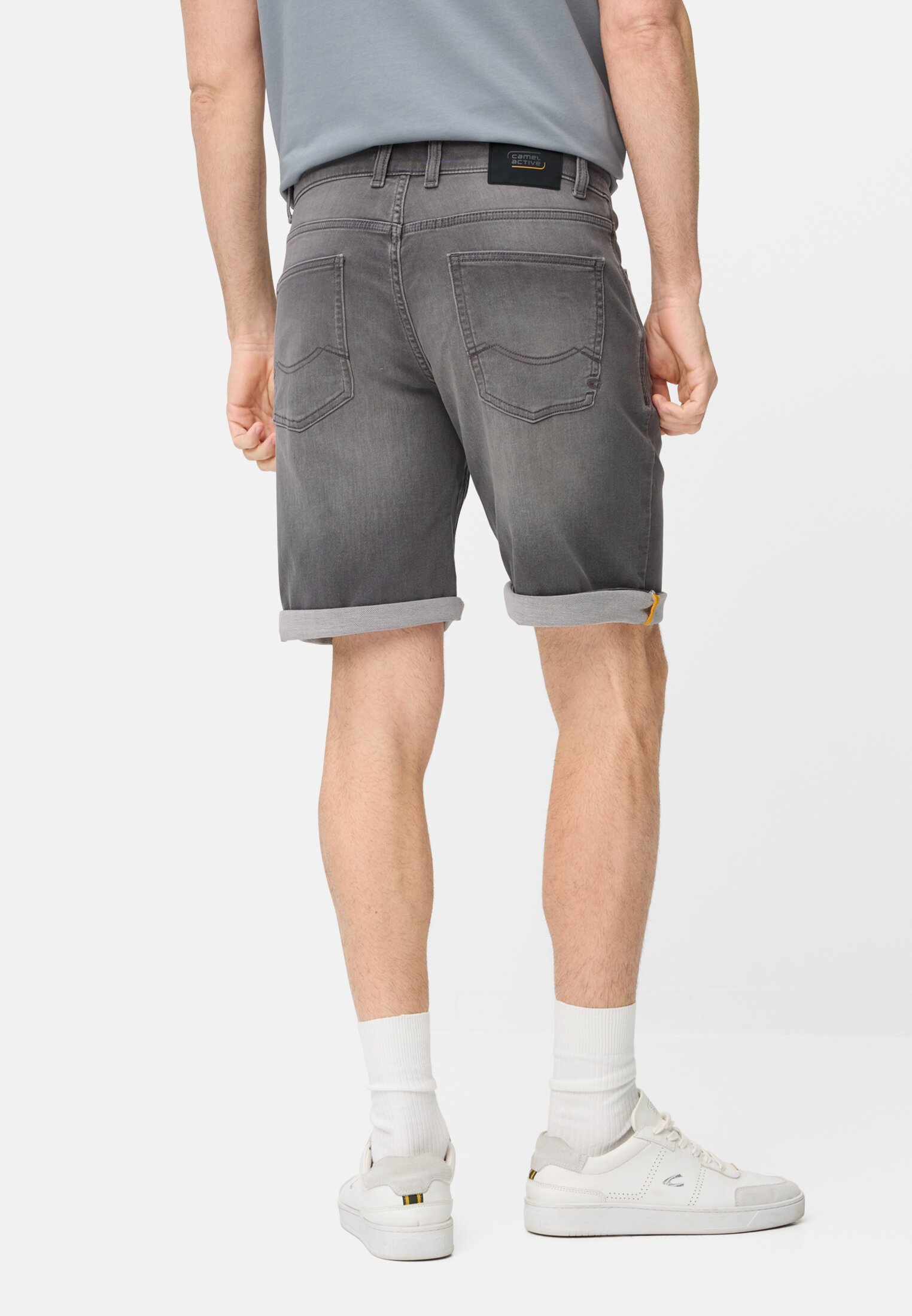 Men fleXXXactive® Jeans shorts with Zipper Stone Gray worn back