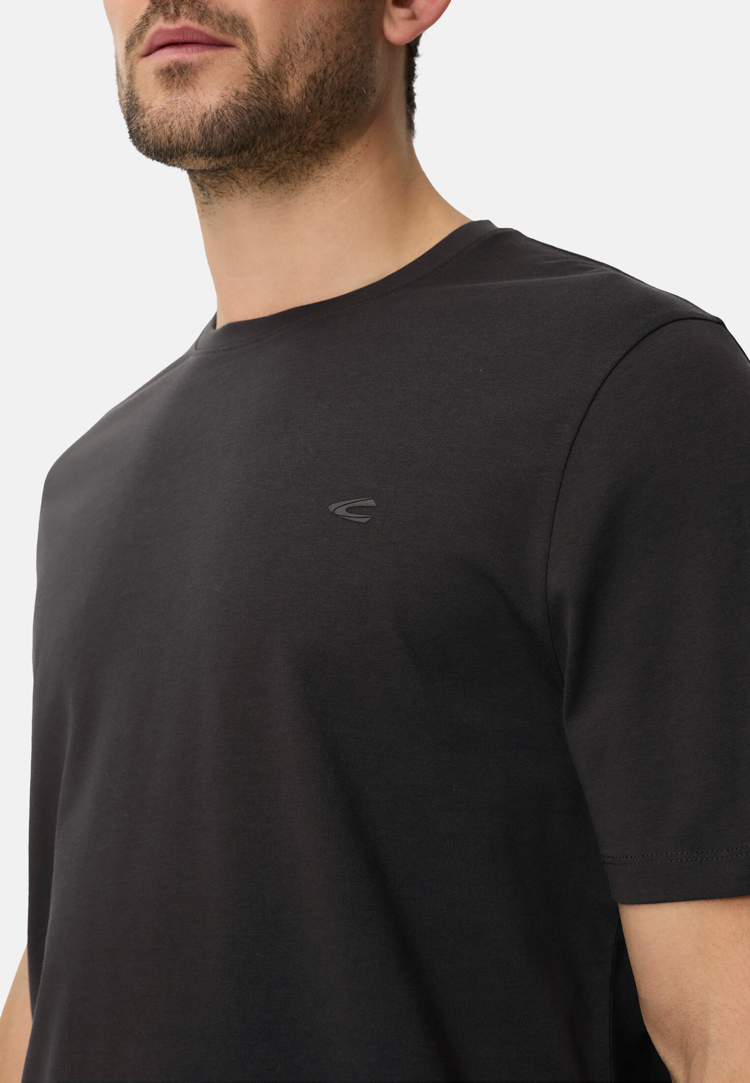 Herren fleXXXactive® T-Shirt mit Quick Dry Funktion Schwarz getragen detailliert nah