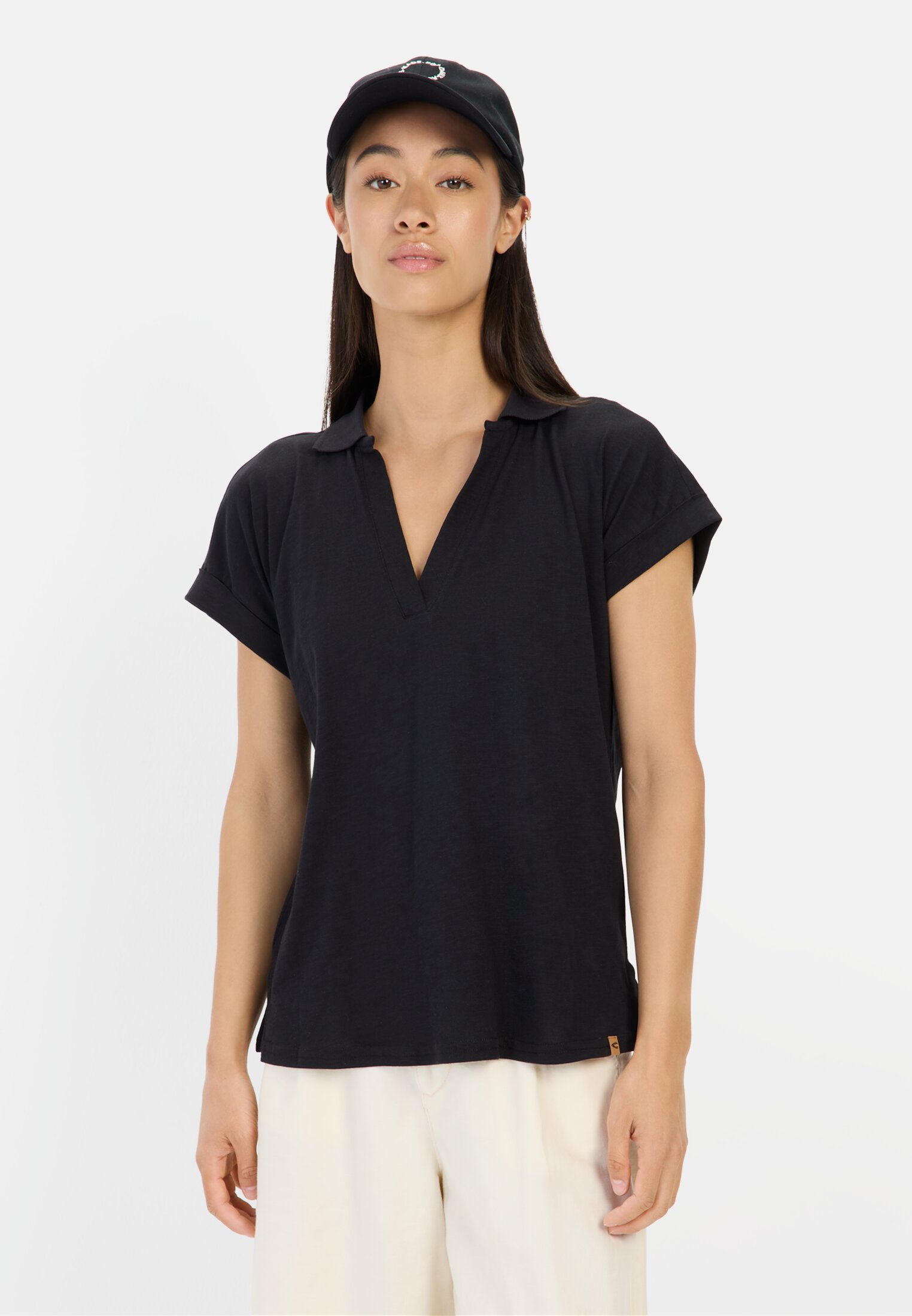 Vrouwen T-shirt met polokraag Zwart gedragen voor