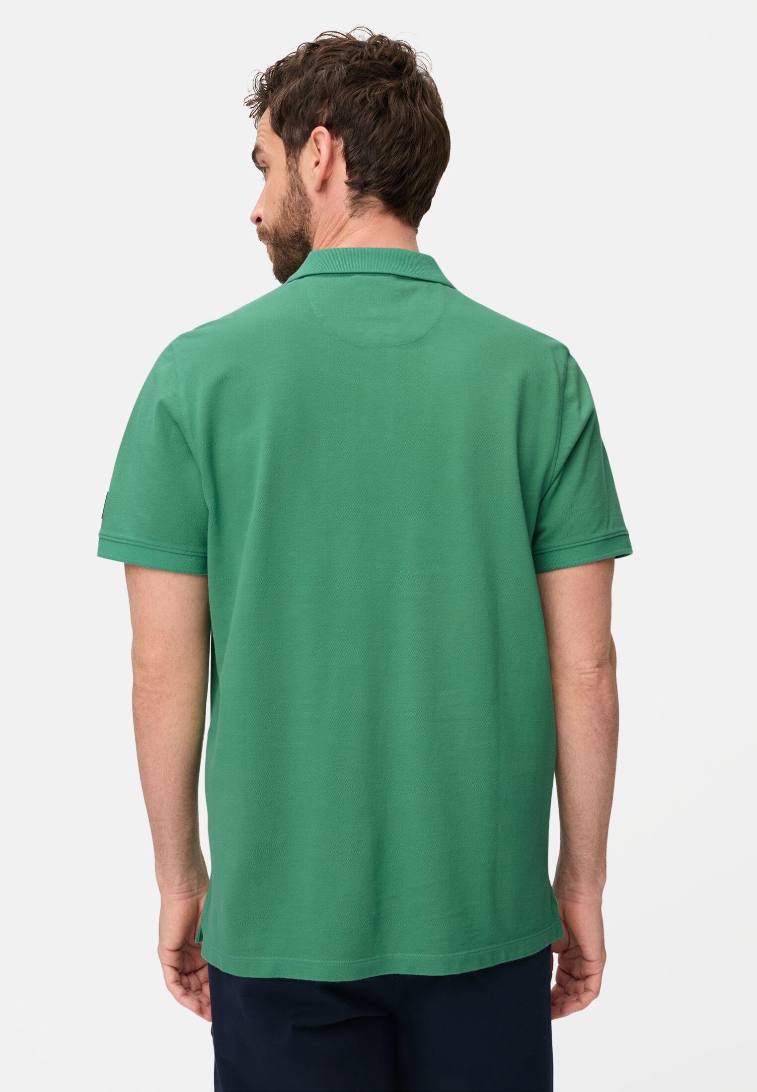 Men Polo shirt made of pure cotton Lagoon Green worn back