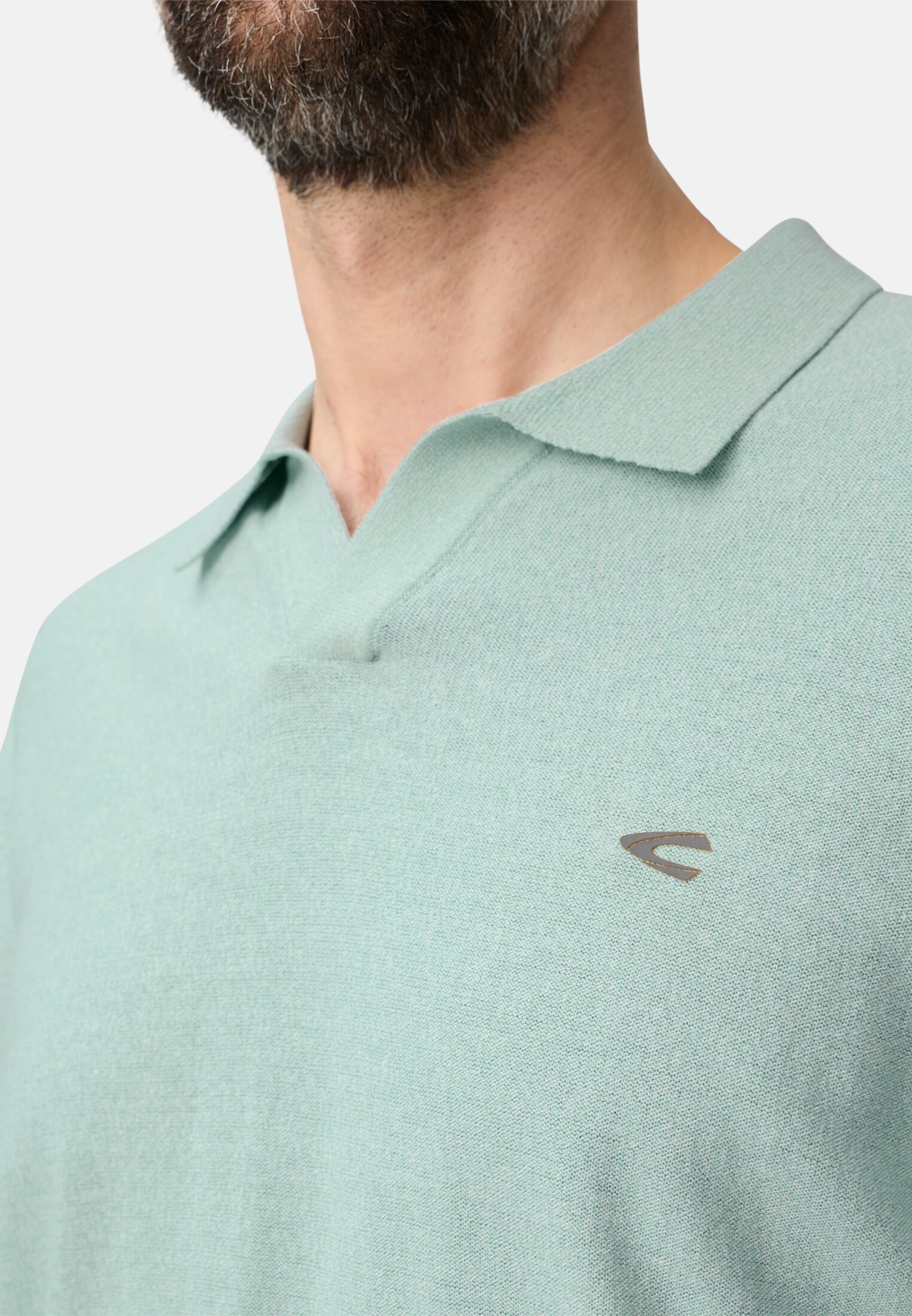 Heren Gevlekt poloshirt met korte mouwen van katoen Oceaangroen gedragen detail dichtbij