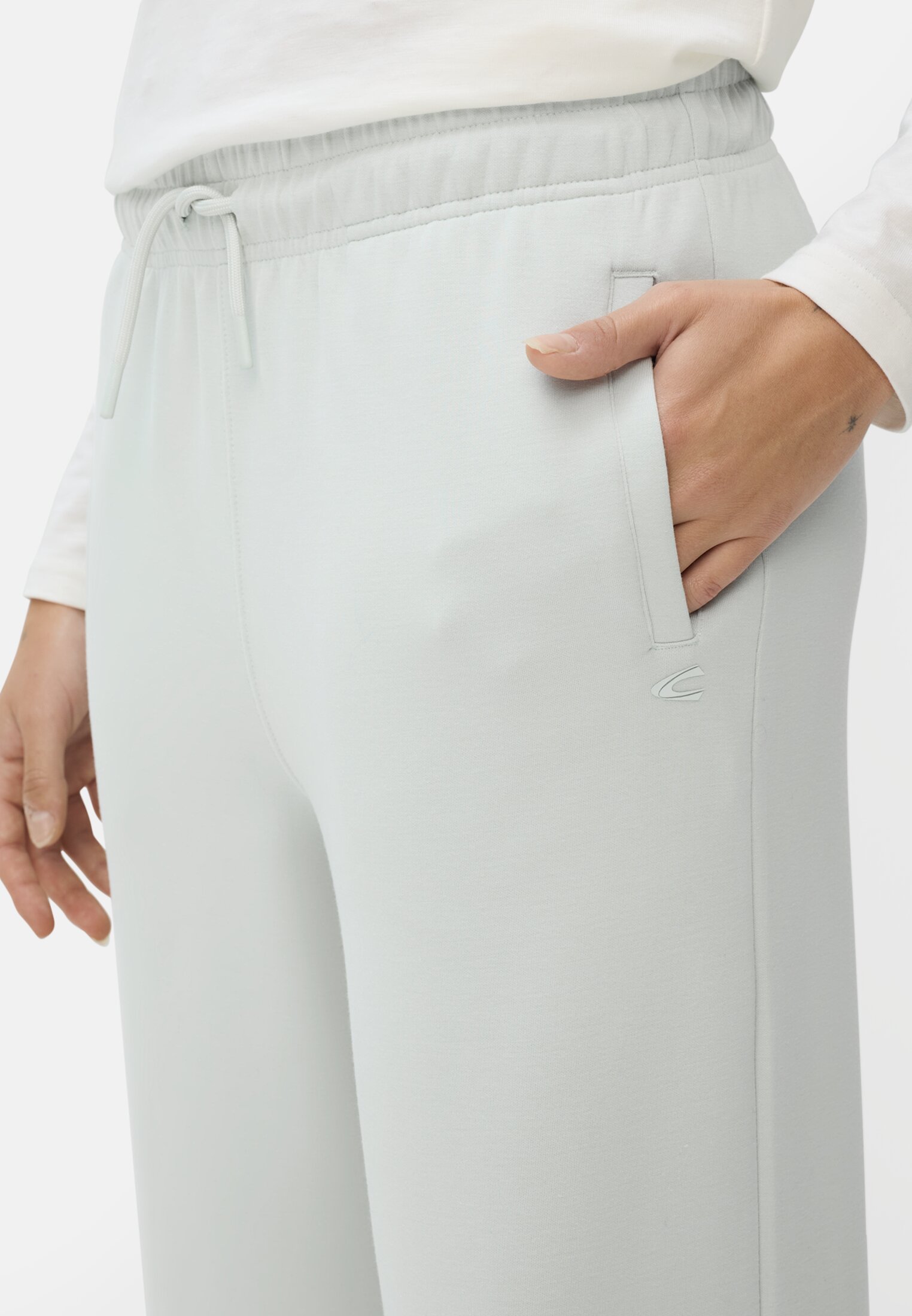 Women Casual trousers with adjustable waistband worn detail close