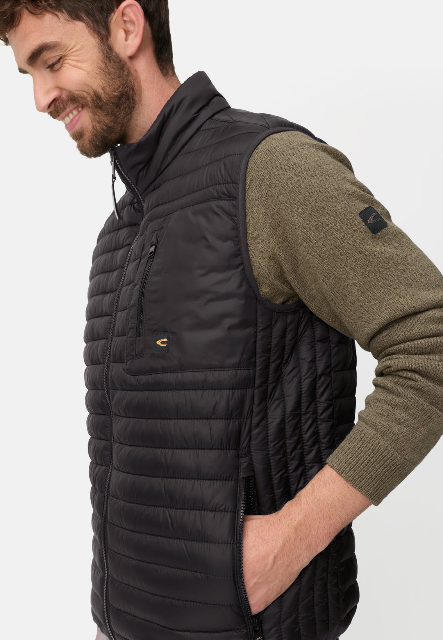 Men Vest with water-repellent function Black worn detail close