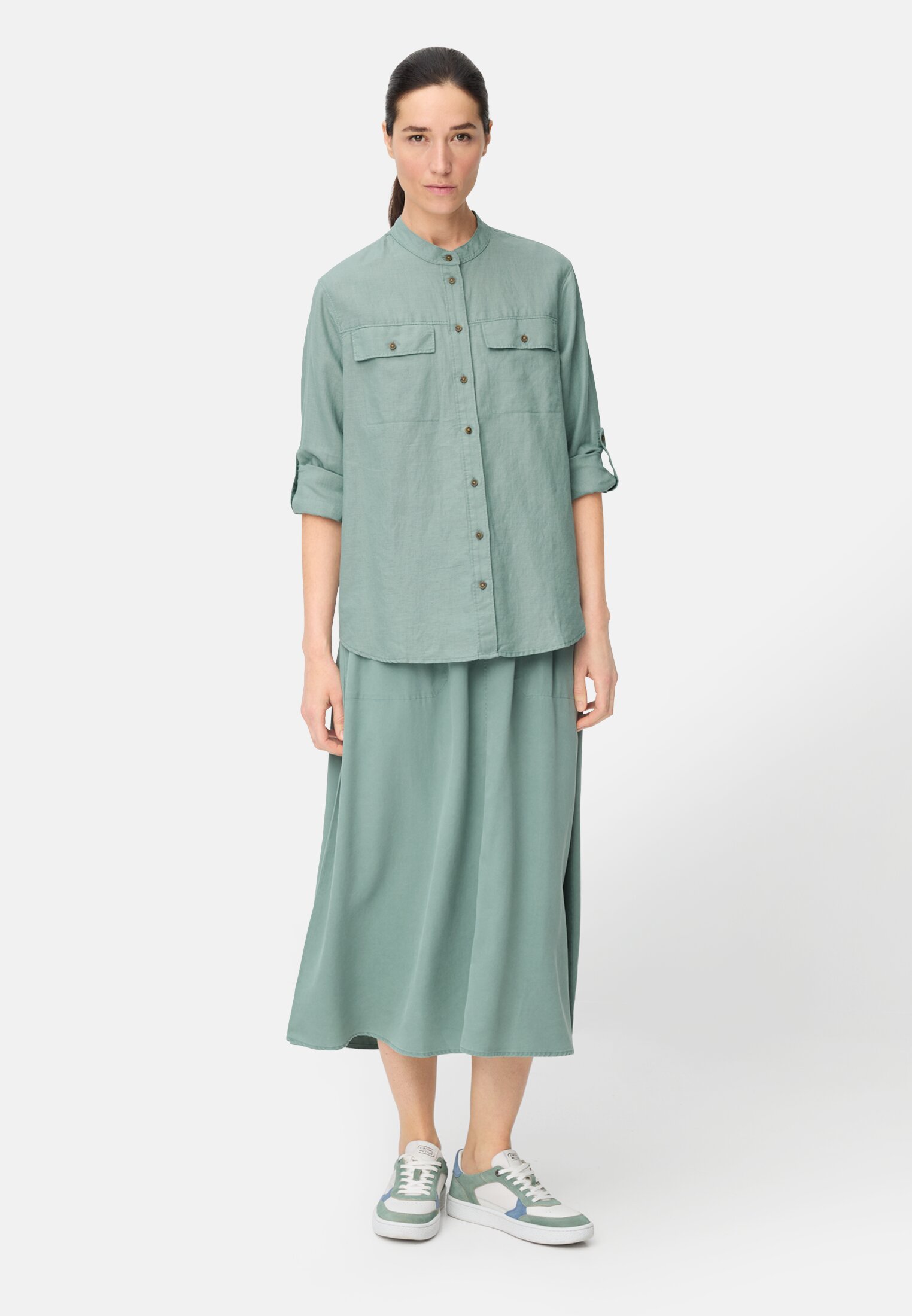 Women Blouse with stand-up collar and button placket Jade Blue worn front full body