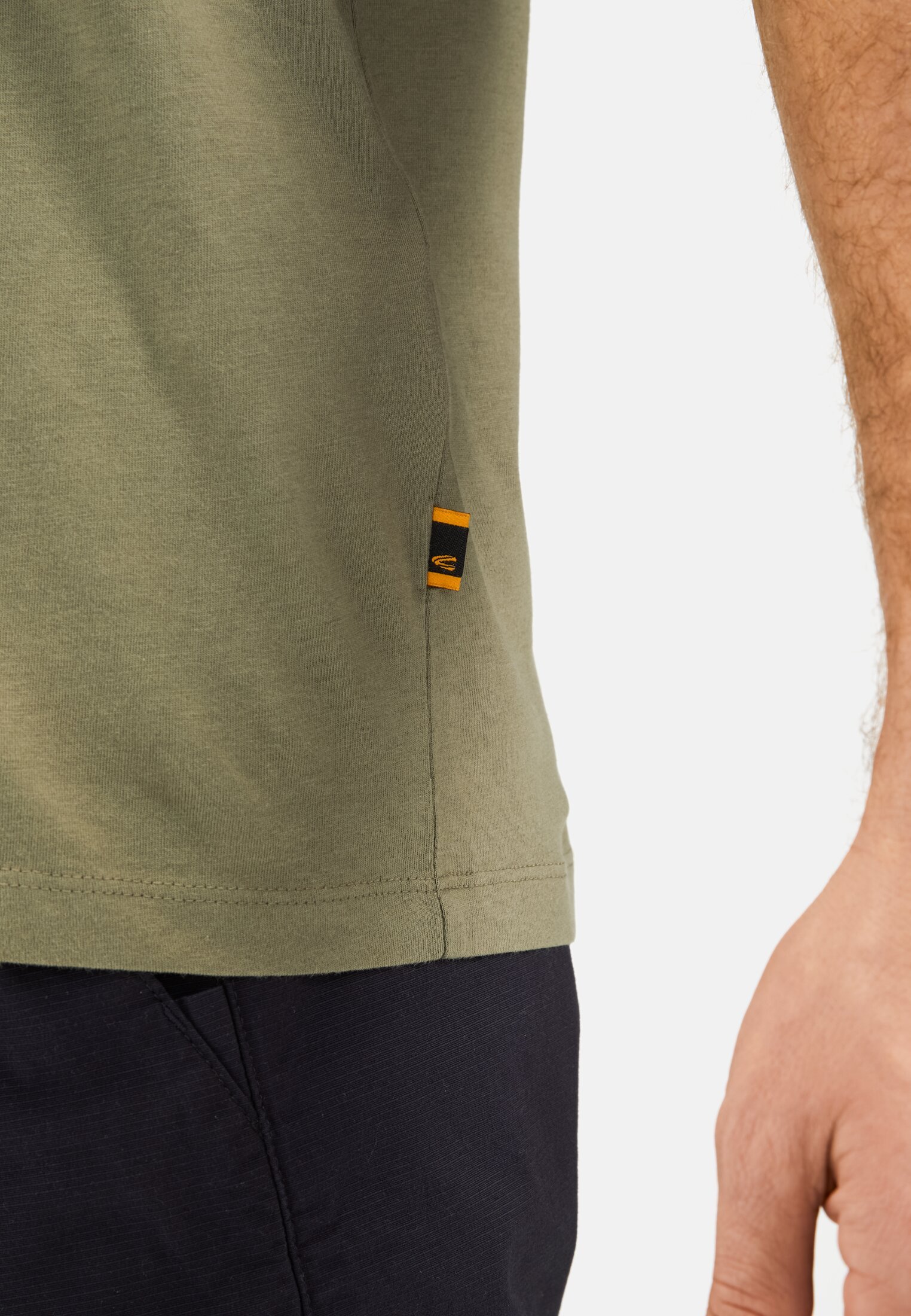 Men T-shirt made from organic cotton Dark green worn detail close