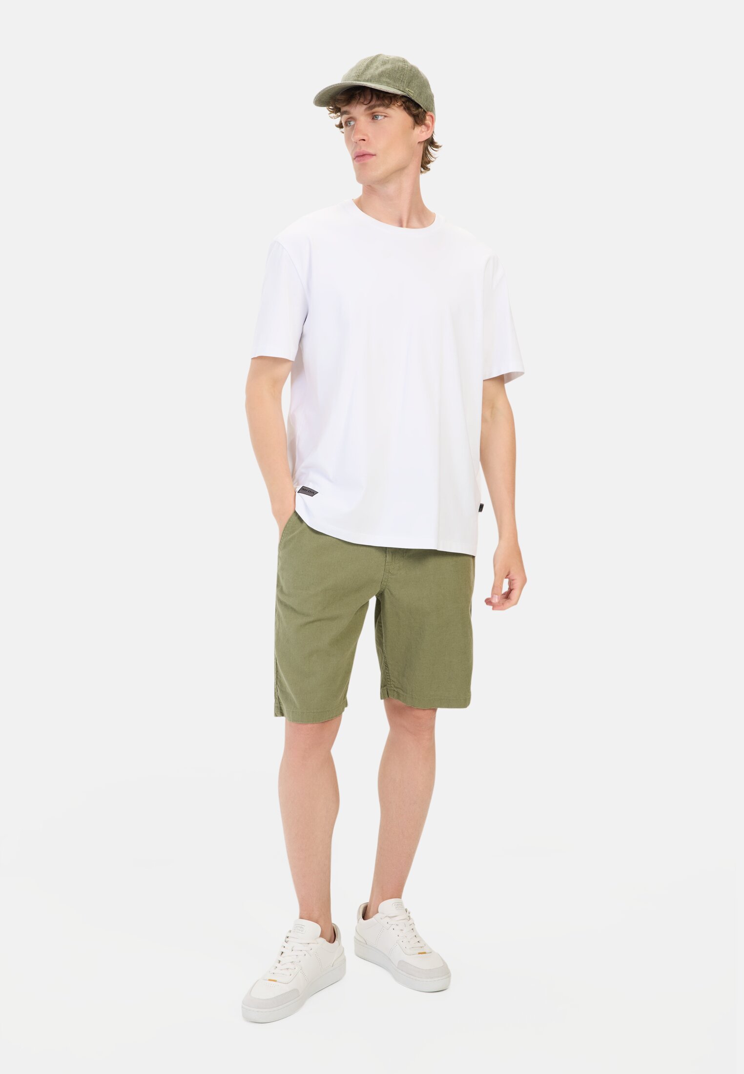 Men Chino shorts with elastic waistband Green worn front full body