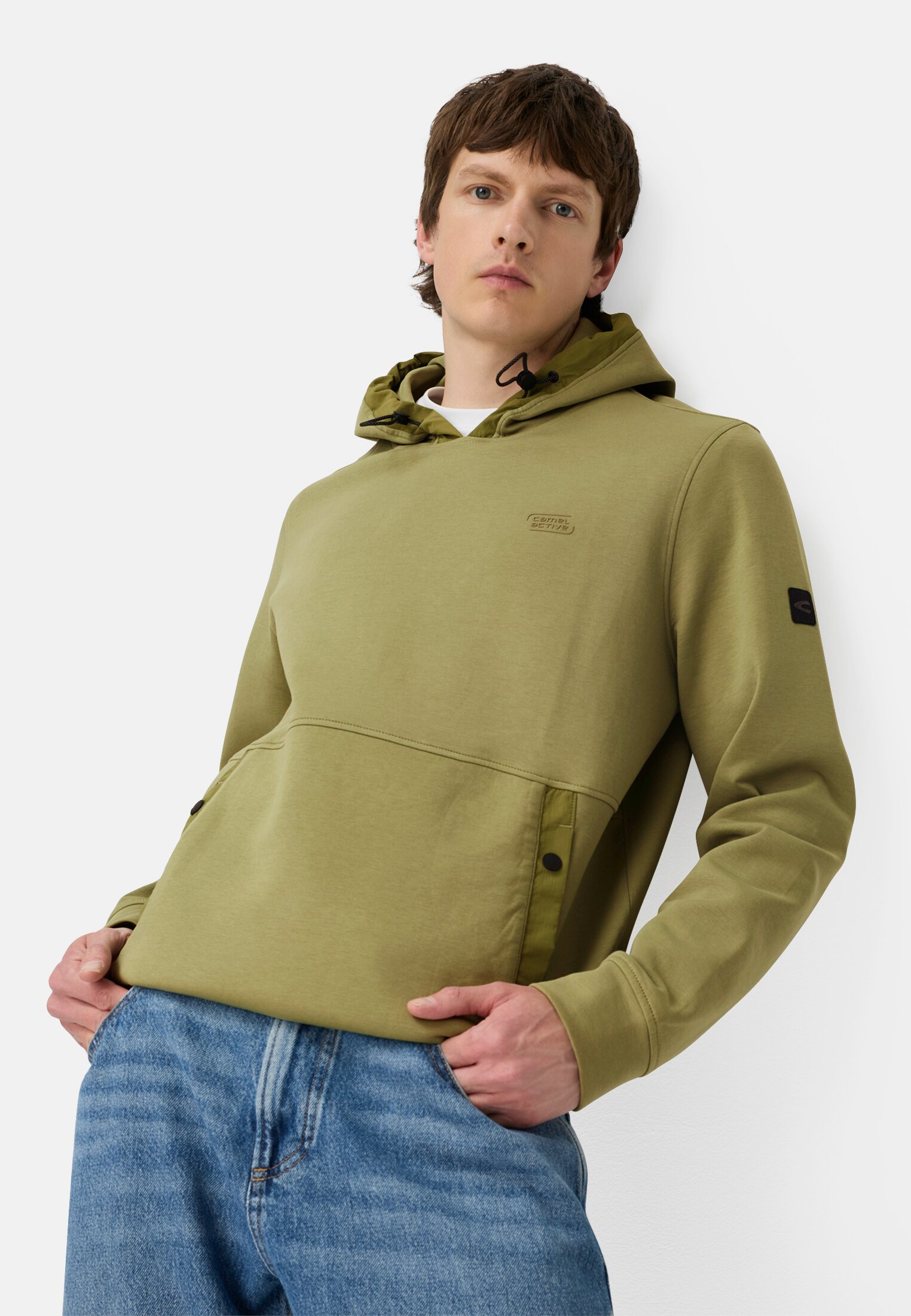 Herren fleXXXactive® Hoodie mit verstellbarer Kapuze Moosstein getragen emotional